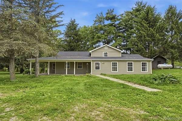 7.1 Acres of Land with Home for Sale in Burns Township, Michigan