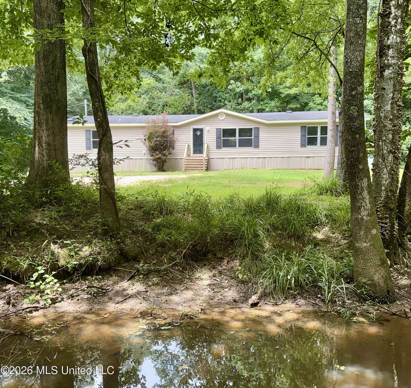 3.22 Acres of Land with Home for Sale in Summit, Mississippi