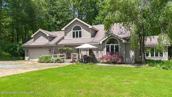 5 Acres of Land with Home for Sale in Clifford Township, Pennsylvania