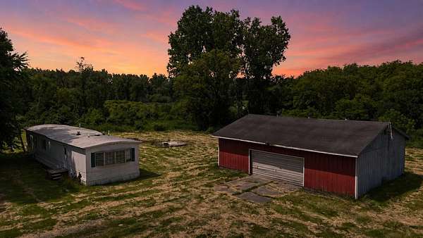35 Acres of Land with Home for Sale in Pleasant Lake, Michigan