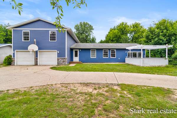 2.72 Acres of Land with Home for Sale in Fruitport, Michigan