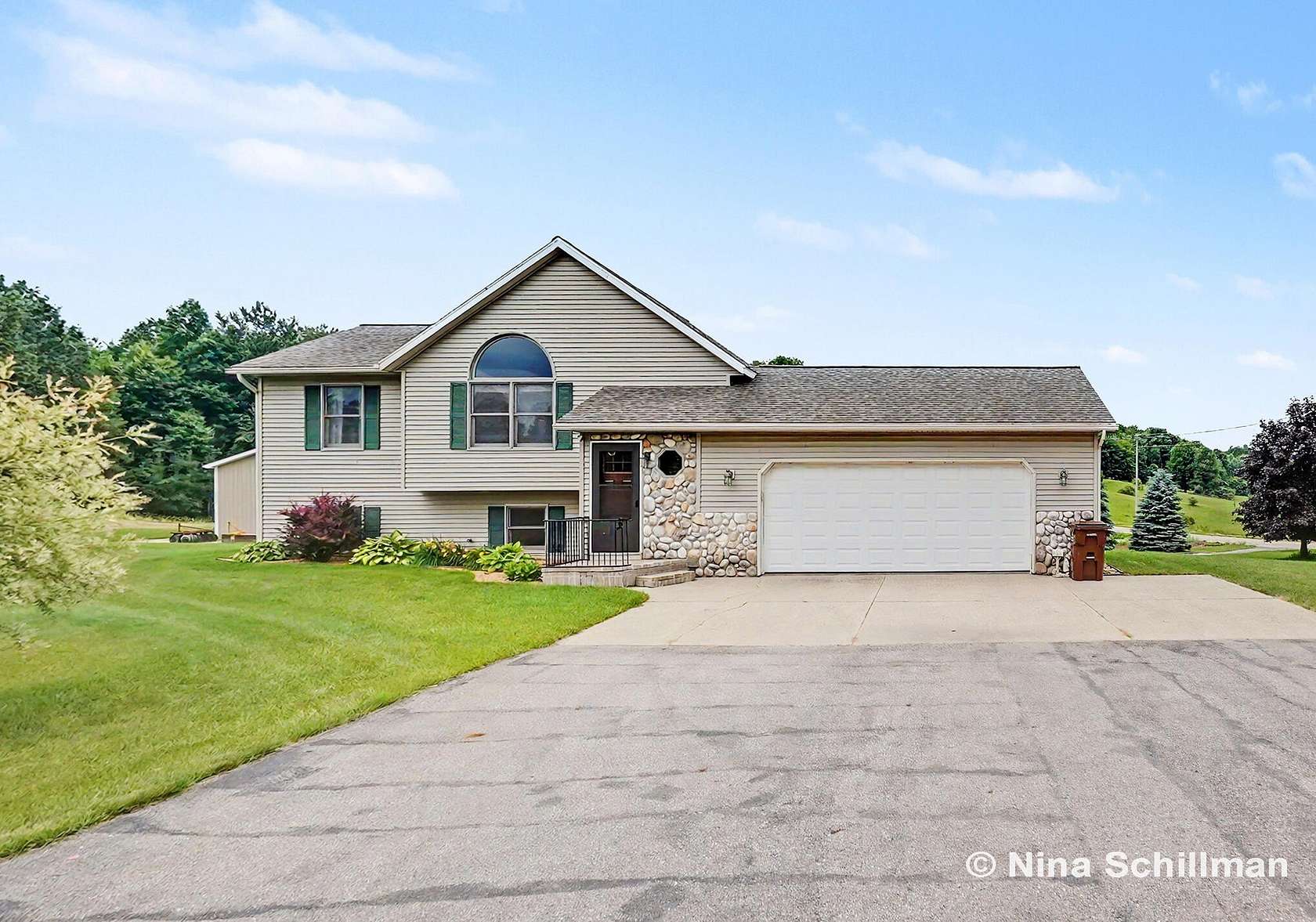 5 Acres of Land with Home for Sale in Sand Lake, Michigan