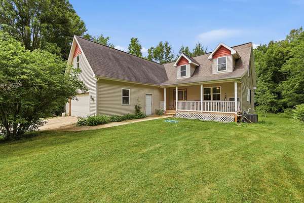 3 Acres of Land with Home for Sale in Coopersville, Michigan