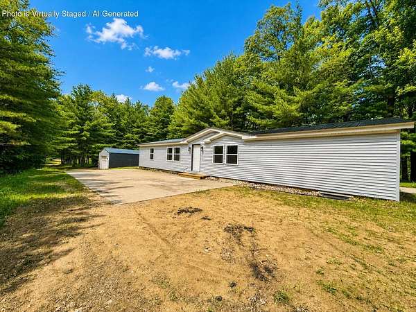 9.23 Acres of Land with Home for Sale in West Branch, Michigan