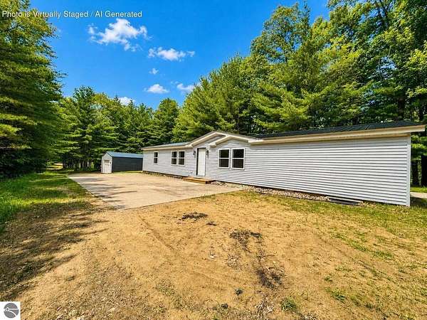 9.23 Acres of Land with Home for Sale in West Branch, Michigan