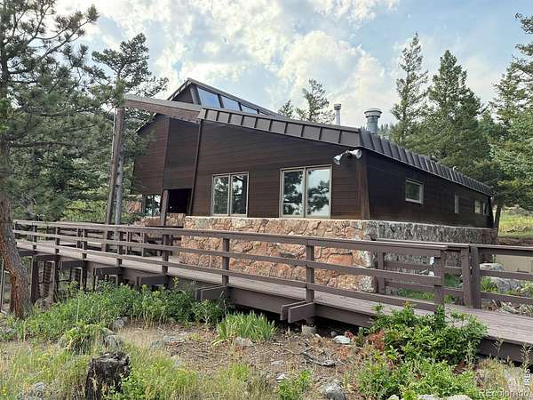 18.7 Acres of Recreational Land with Home for Sale in Boulder, Colorado