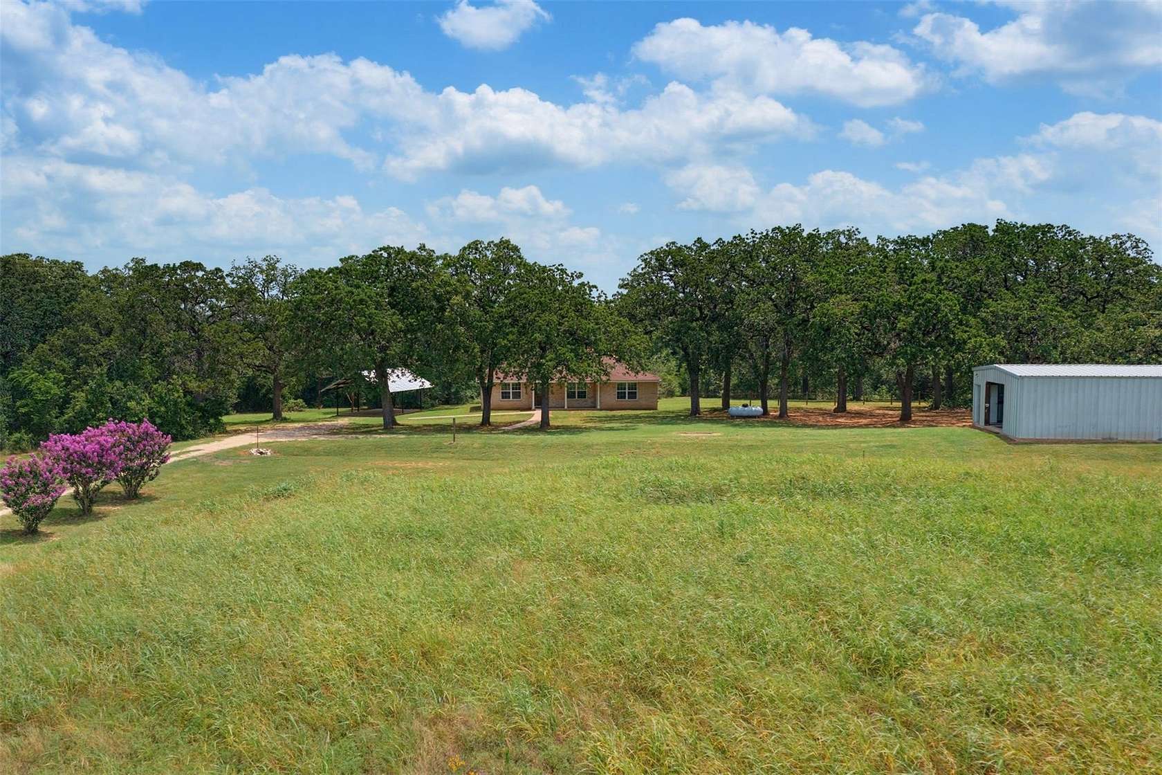 10 Acres of Land with Home for Sale in Rockdale, Texas