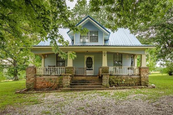 5.2 Acres of Land with Home for Sale in Huntsville, Arkansas