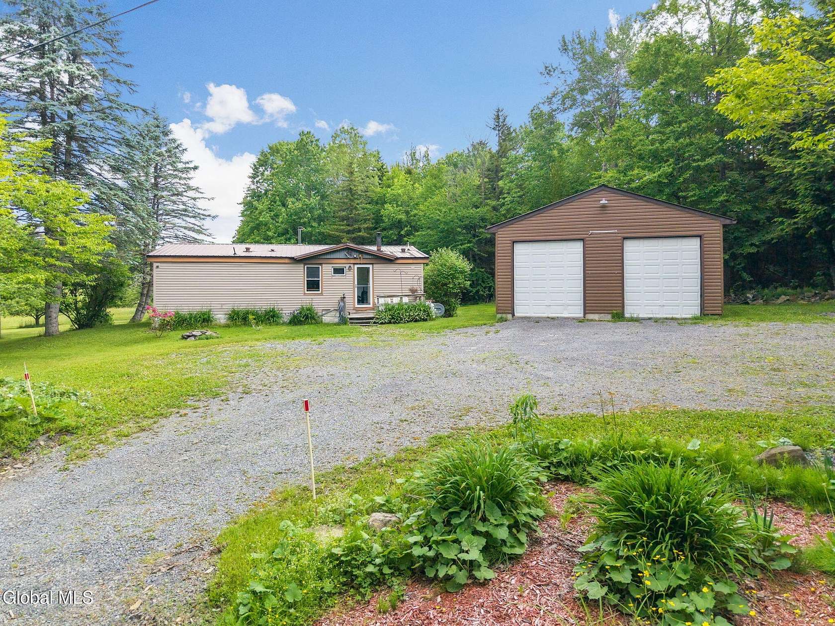 28.4 Acres of Recreational Land with Home for Sale in Summit, New York