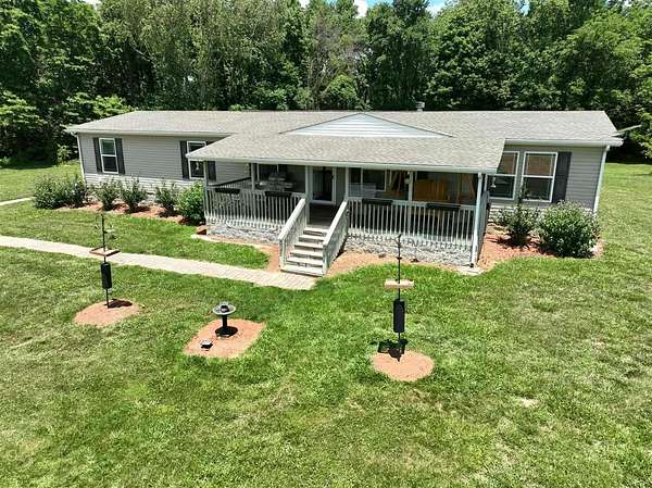 21 Acres of Land with Home for Sale in Scottsville, Kentucky