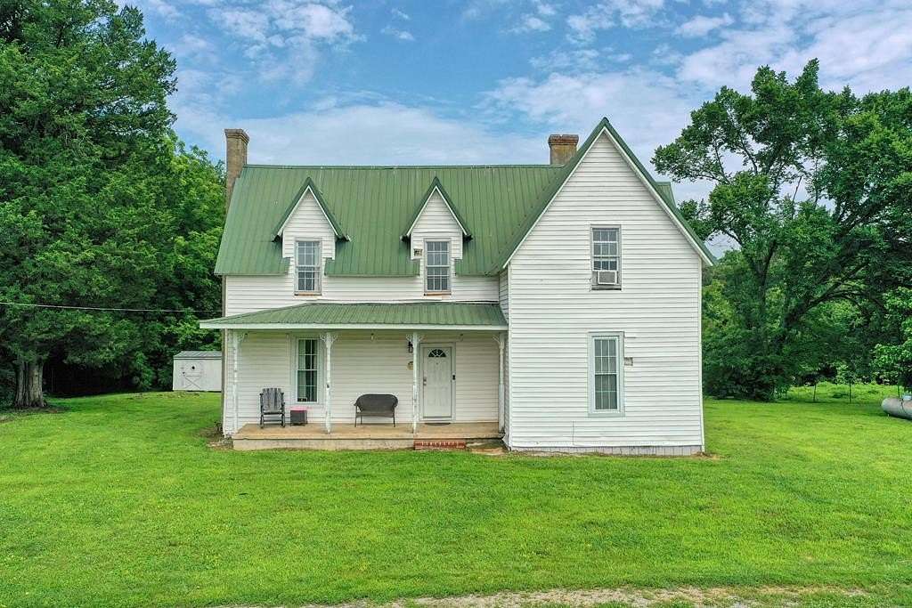 5.62 Acres of Land with Home for Sale in Henry, Tennessee