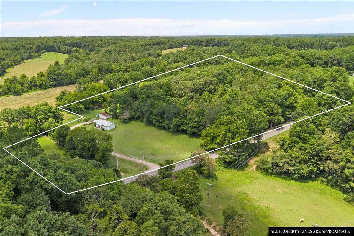 10.9 Acres of Land with Home for Sale in Centerville, Tennessee