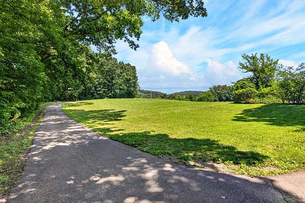 22.9 Acres of Recreational Land with Home for Sale in Cleveland, Tennessee