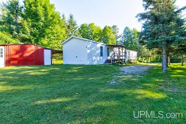 5 Acres of Land with Home for Sale in Daggett, Michigan