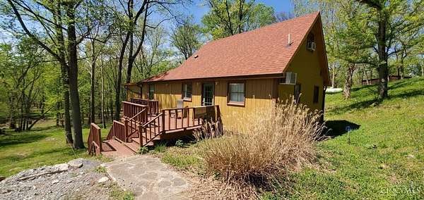 35 Acres of Land with Home for Sale in Huntington Township, Ohio