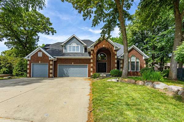 1.88 Acres of Land with Home for Sale in Clive, Iowa