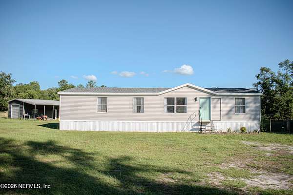2 Acres of Land with Home for Sale in Lake Butler, Florida