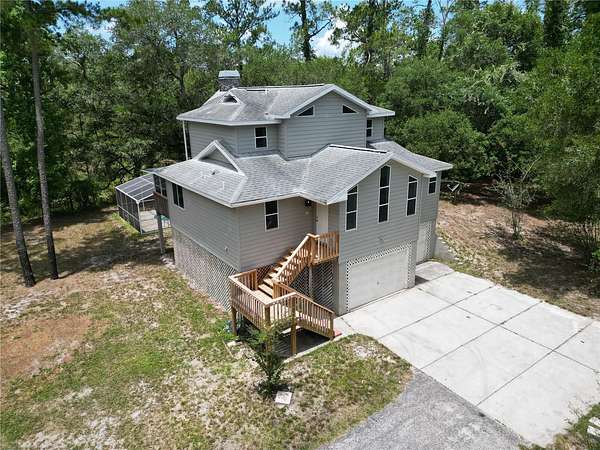 6.1 Acres of Land with Home for Sale in Dade City, Florida