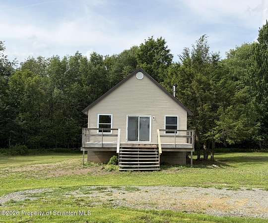 14.1 Acres of Land with Home for Sale in Thompson, Pennsylvania