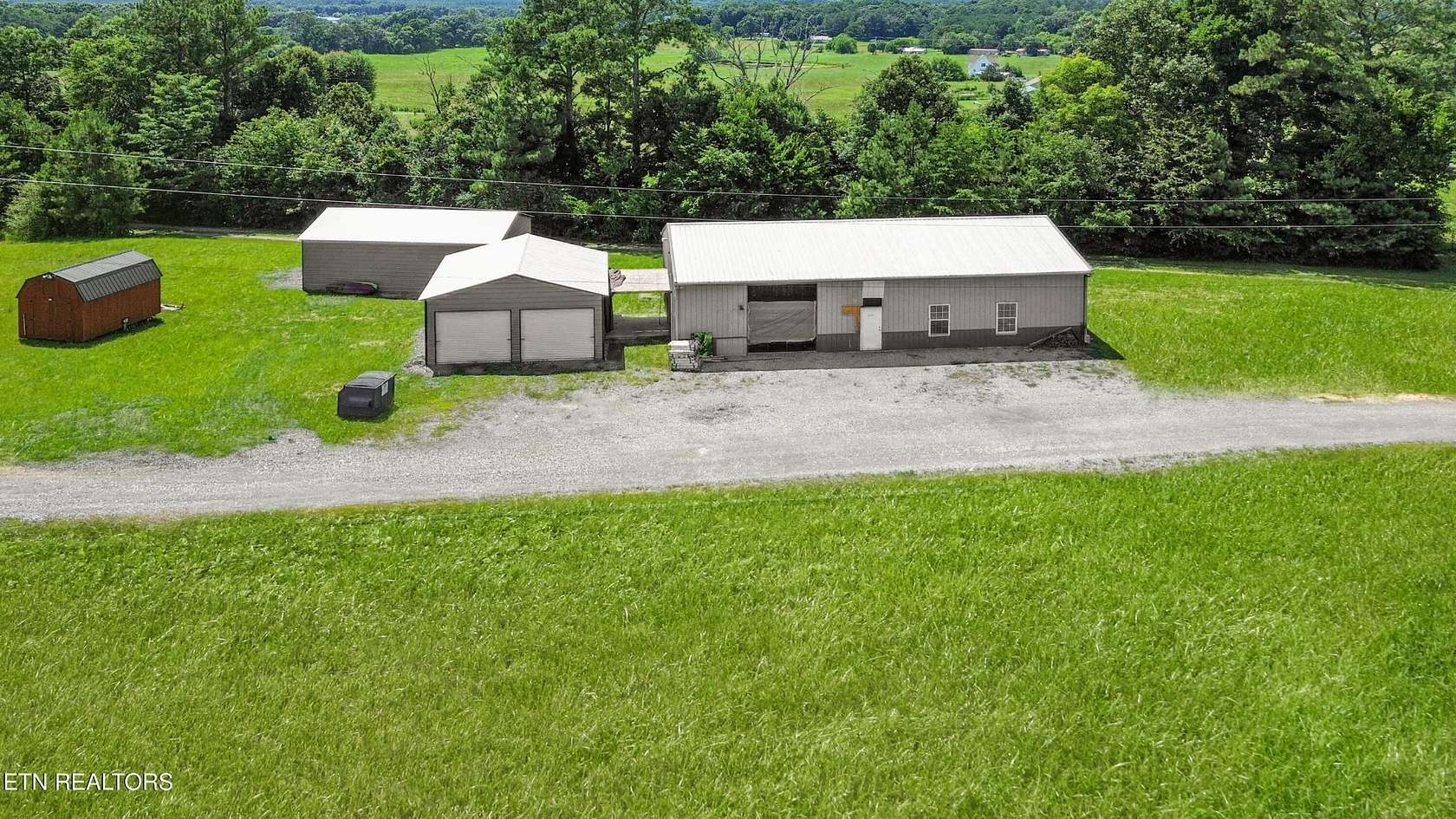 7.32 Acres of Improved Mixed-Use Land for Sale in Oldfort, Tennessee
