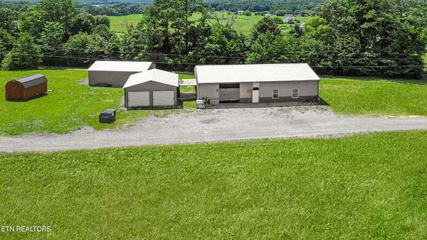 7.32 Acres of Improved Mixed-Use Land for Sale in Oldfort, Tennessee