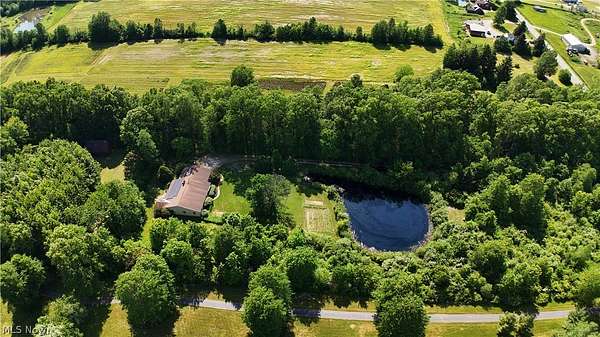 10 Acres of Land with Home for Sale in Grafton, Ohio