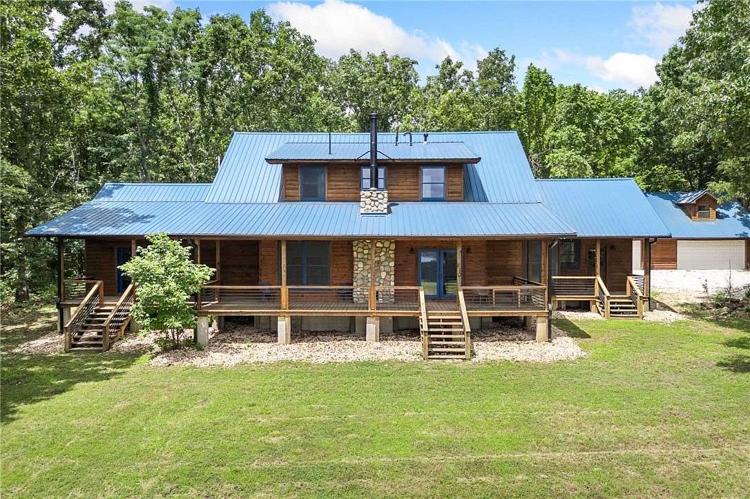 7.26 Acres of Land with Home for Sale in Lead Hill, Arkansas