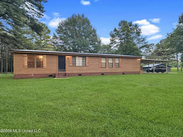 9.3 Acres of Land with Home for Sale in Braxton, Mississippi