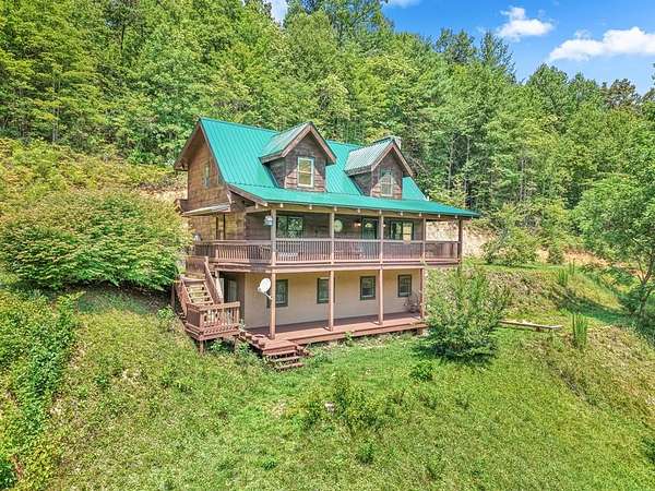 9.23 Acres of Land with Home for Sale in Bryson City, North Carolina