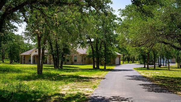 5 Acres of Land with Home for Sale in Floresville, Texas