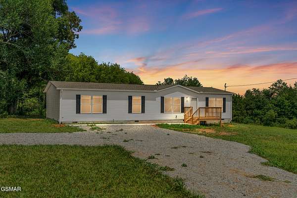 1.52 Acres of Land with Home for Sale in Madisonville, Tennessee