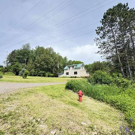 20 Acres of Recreational Land with Home for Sale in Iron River, Michigan