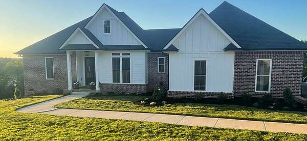 10 Acres of Land with Home for Sale in Palmyra, Tennessee