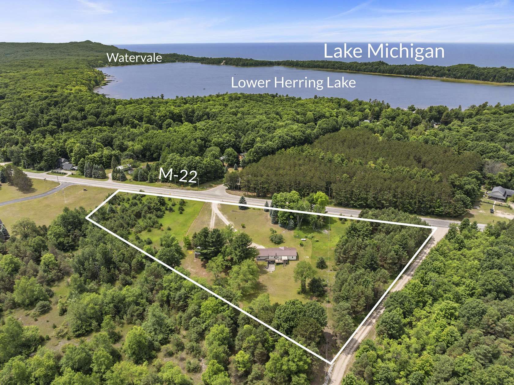 6.53 Acres of Land with Home for Sale in Frankfort, Michigan