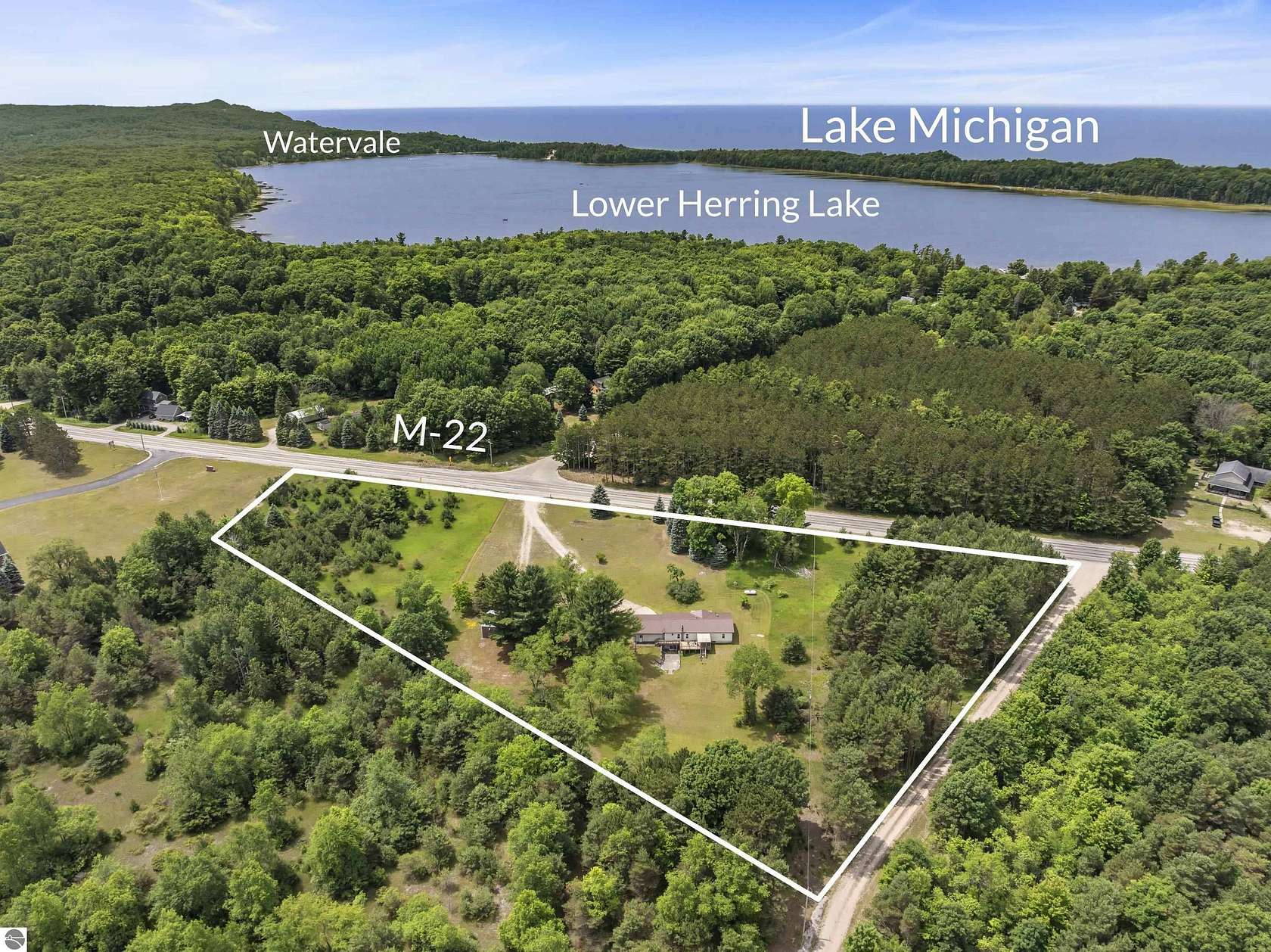 6.53 Acres of Land with Home for Sale in Frankfort, Michigan