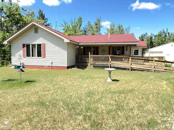 7.89 Acres of Land with Home for Sale in Vanderbilt, Michigan