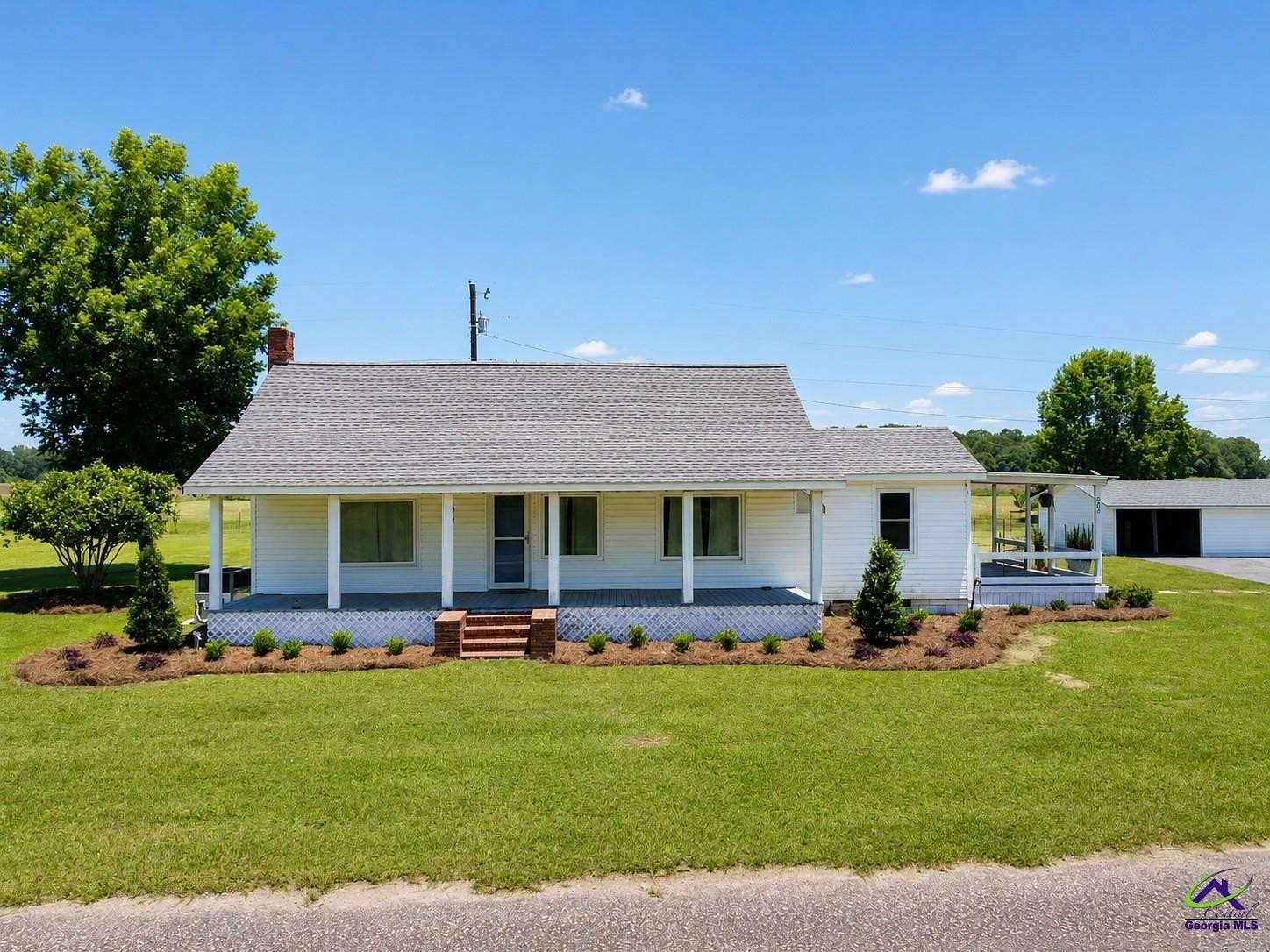 12.8 Acres of Land with Home for Sale in Cochran, Georgia
