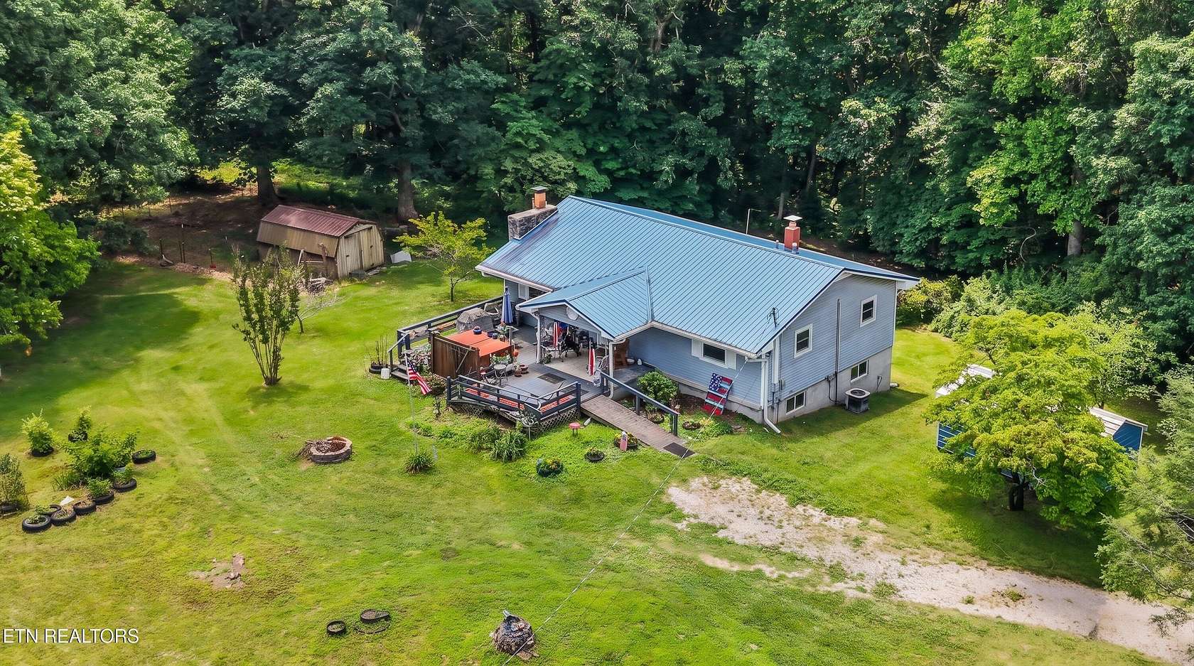 13.1 Acres of Land with Home for Sale in Deer Lodge, Tennessee