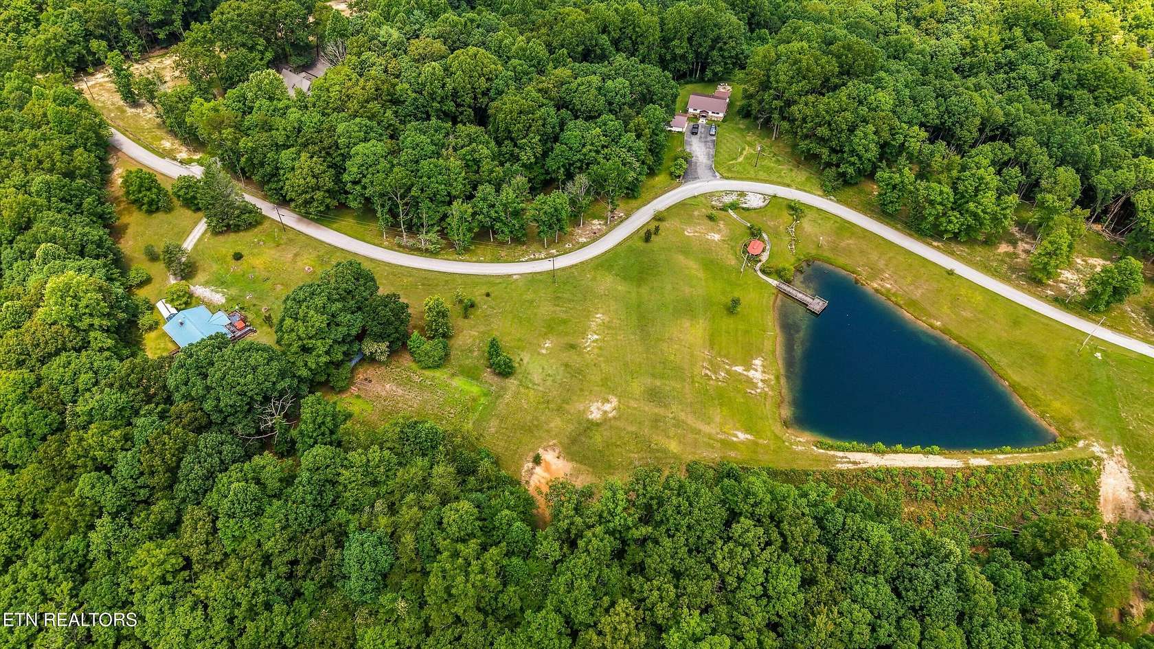 13.1 Acres of Land with Home for Sale in Deer Lodge, Tennessee