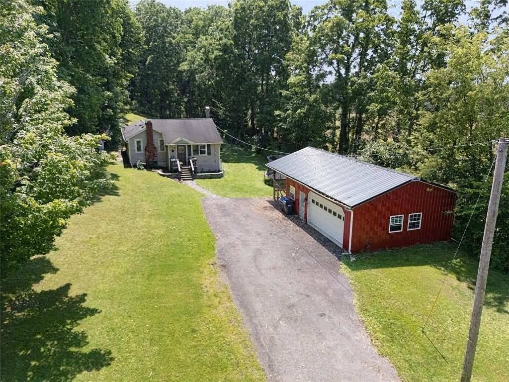 7.76 Acres of Land with Home for Sale in Marion, New York