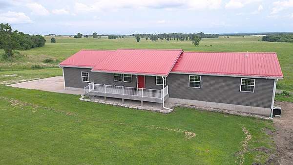 8.29 Acres of Land with Home for Sale in Halfway, Missouri