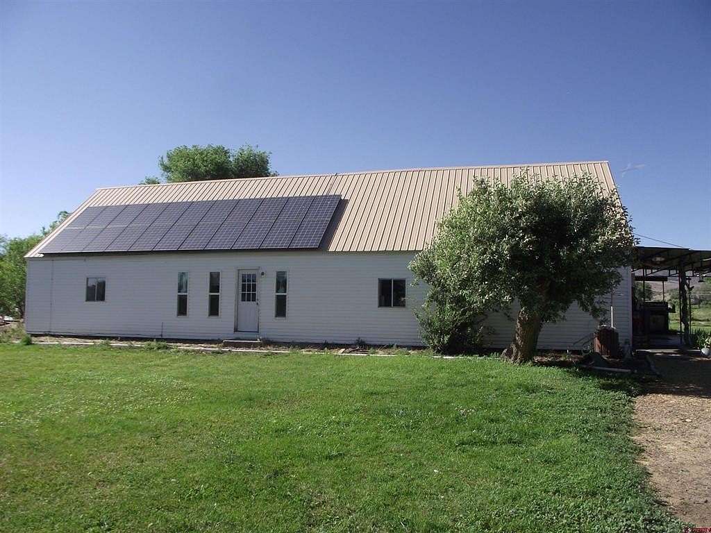 5.25 Acres of Land with Home for Sale in Hotchkiss, Colorado