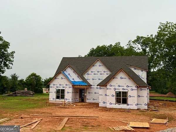 2.46 Acres of Land with Home for Sale in Sharpsburg, Georgia