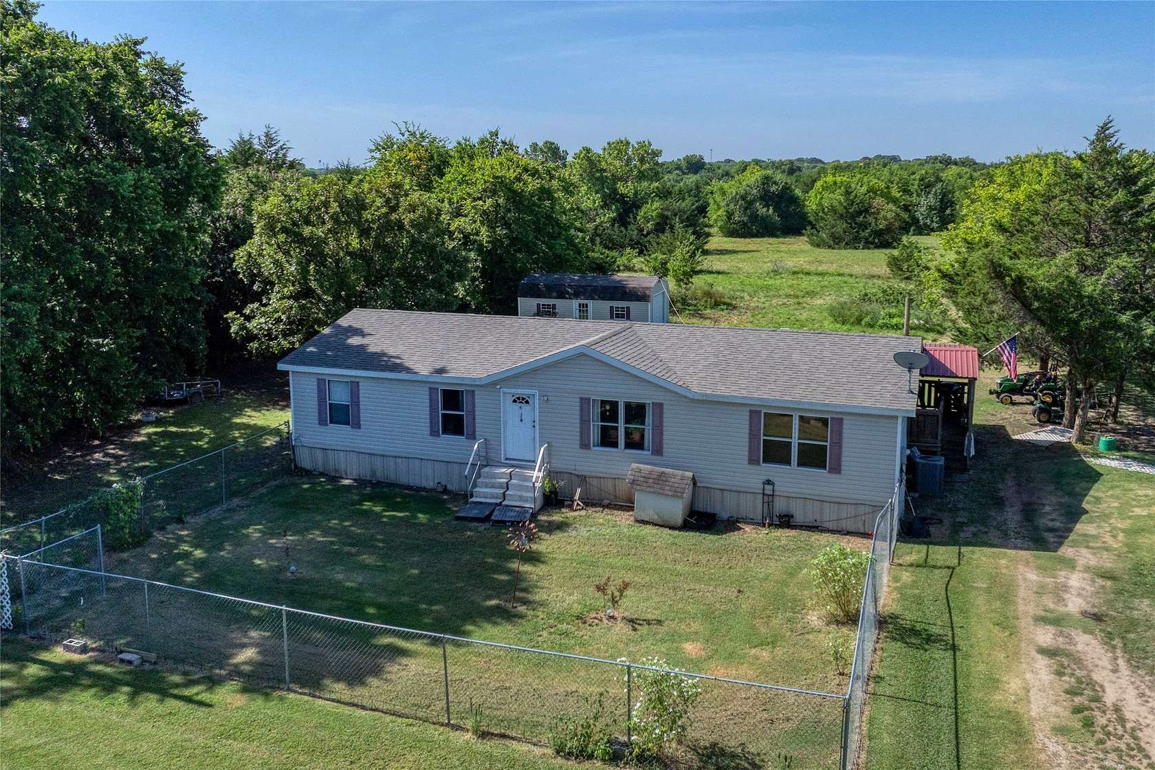 9.39 Acres of Land with Home for Sale in Sherman, Texas