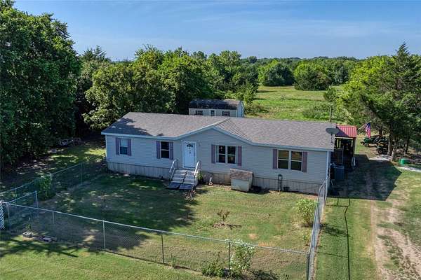 9.39 Acres of Land with Home for Sale in Sherman, Texas