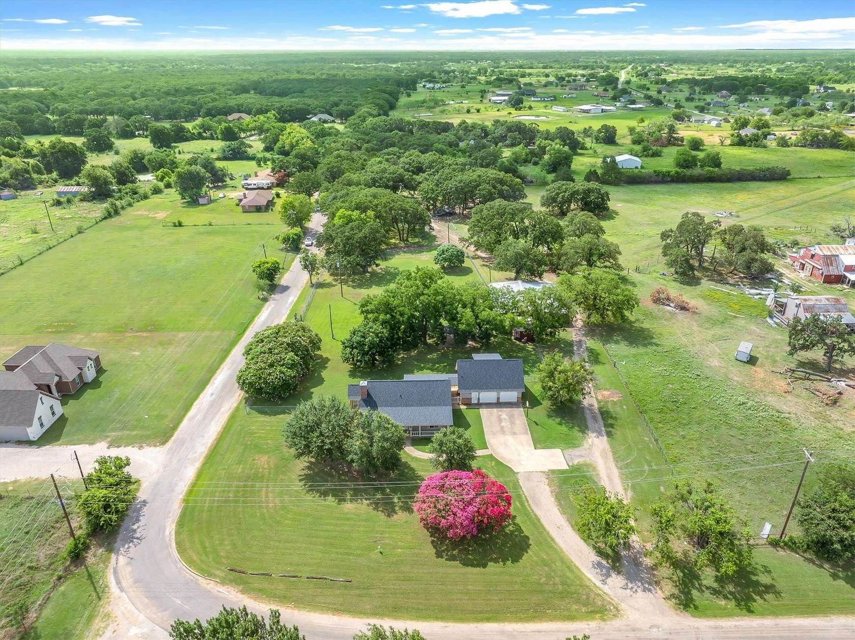 1.76 Acres of Land with Home for Sale in Scurry, Texas
