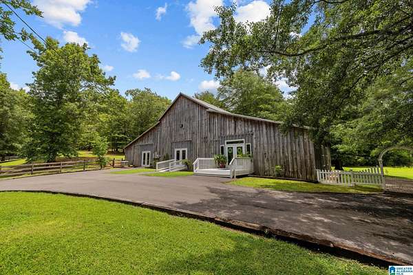 82 Acres of Recreational Land with Home for Sale in Pell City, Alabama