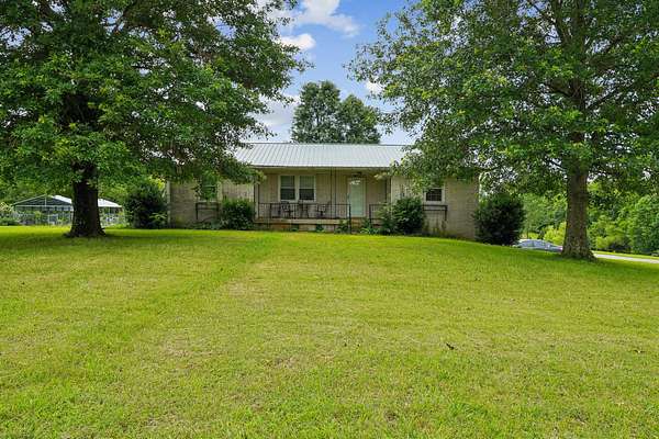 9.24 Acres of Land with Home for Sale in Charlotte, Tennessee