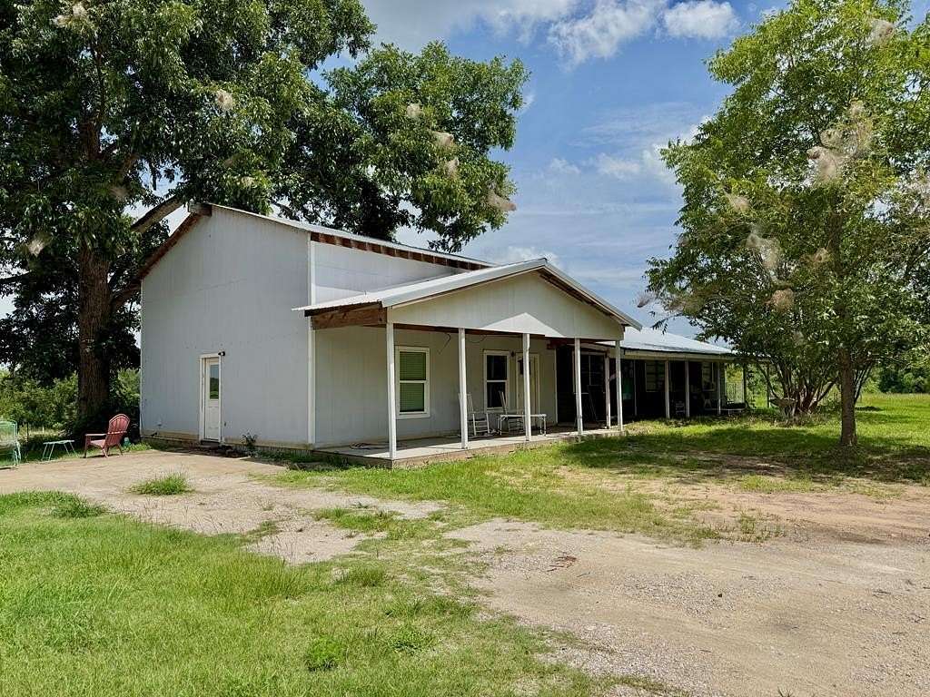 9.5 Acres of Land with Home for Sale in Garrison, Texas