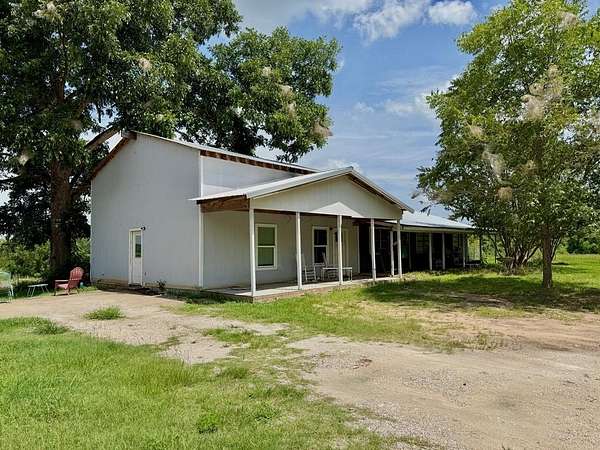 9.5 Acres of Land with Home for Sale in Garrison, Texas